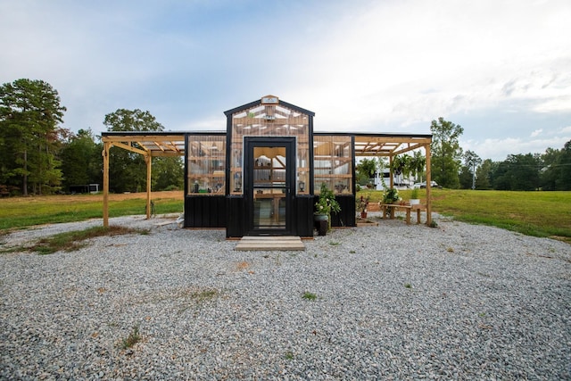 140 Lake Shore Ln, Henderson, TN 38340 - view of greenhouse with a lawn, a carport, and gravel driveway