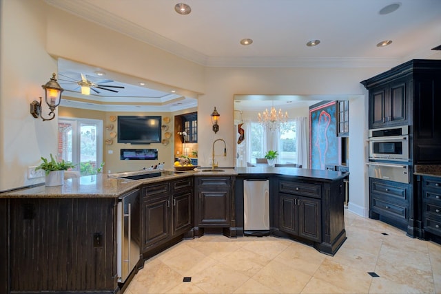 140 Lake Shore Ln, Henderson, TN 38340 - kitchen featuring a warming drawer, a sink, oven, and plenty of natural light