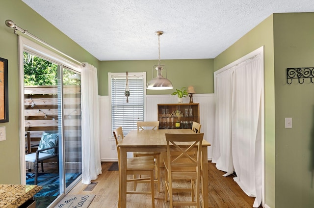 2561 Edinburgh St, Old Hickory, TN 37138 - dining room with a wainscoted wall, a textured ceiling, and wood finished floors