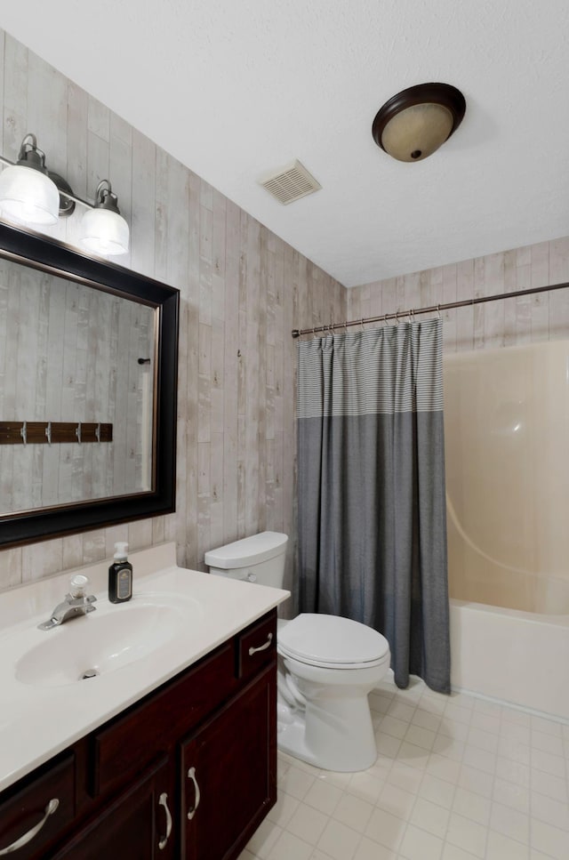 2561 Edinburgh St, Old Hickory, TN 37138 - bathroom with visible vents, wood walls, shower / tub combo, vanity, and toilet