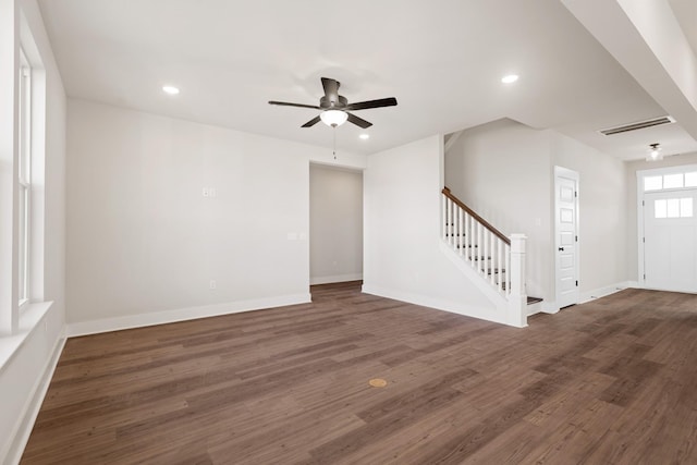 spare room with recessed lighting, stairs, visible vents, a ceiling fan, and wood finished floors