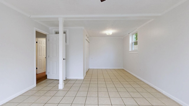 empty room featuring baseboards