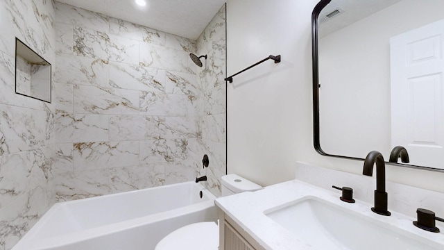 full bathroom with visible vents, toilet, shower / bath combination, and vanity