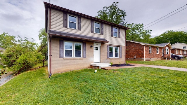 traditional-style home with a front lawn and brick siding