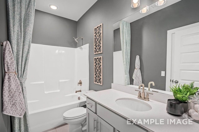 bathroom with tile patterned floors, toilet, shower / bath combination, and vanity