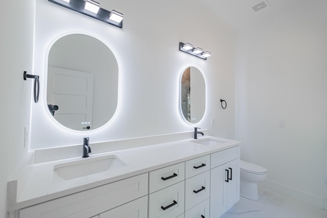 full bath with visible vents, marble finish floor, toilet, and a sink