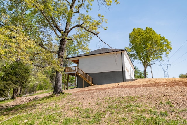 view of outdoor structure with stairway