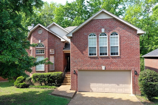 view of front of home featuring brick siding, aphalt driveway, a chimney, and a garage
