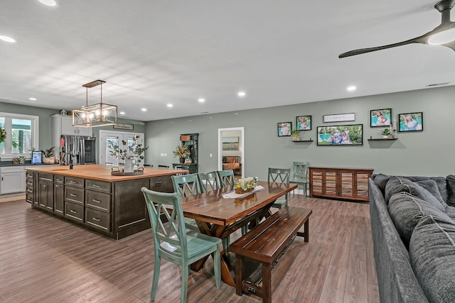 dining room featuring recessed lighting and wood finished floors