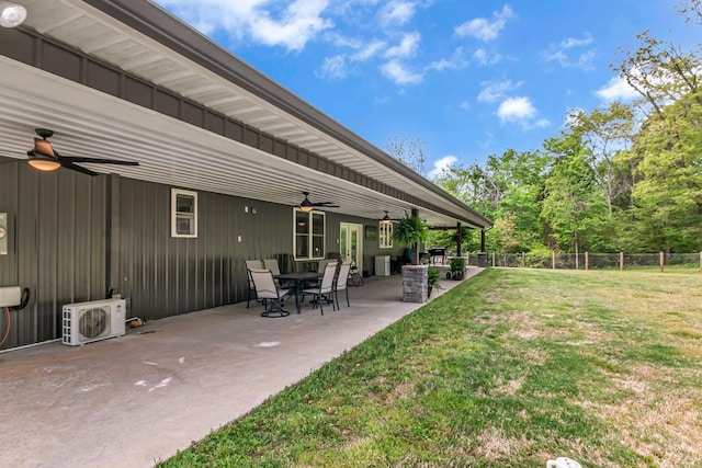 view of yard featuring a patio, ceiling fan, ac unit, and fence