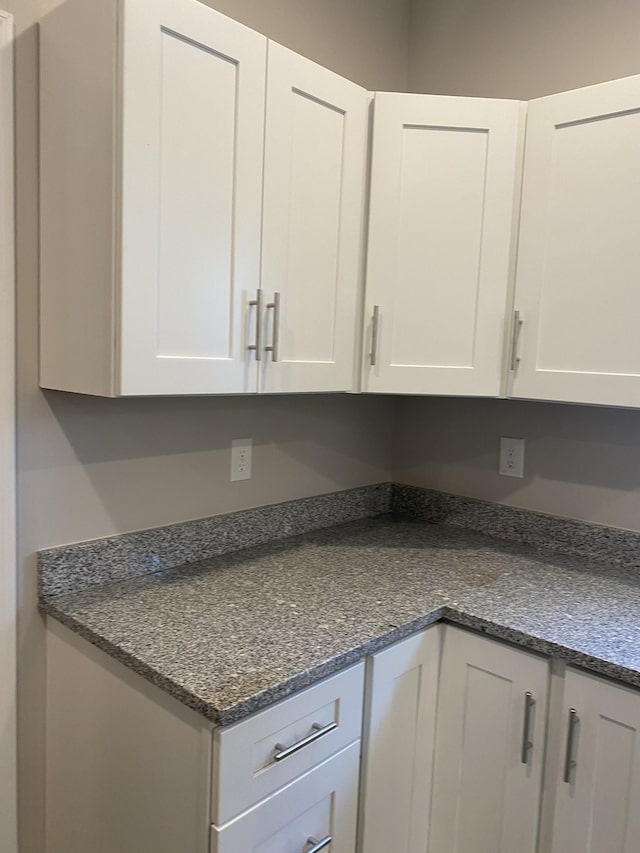 kitchen with white cabinetry