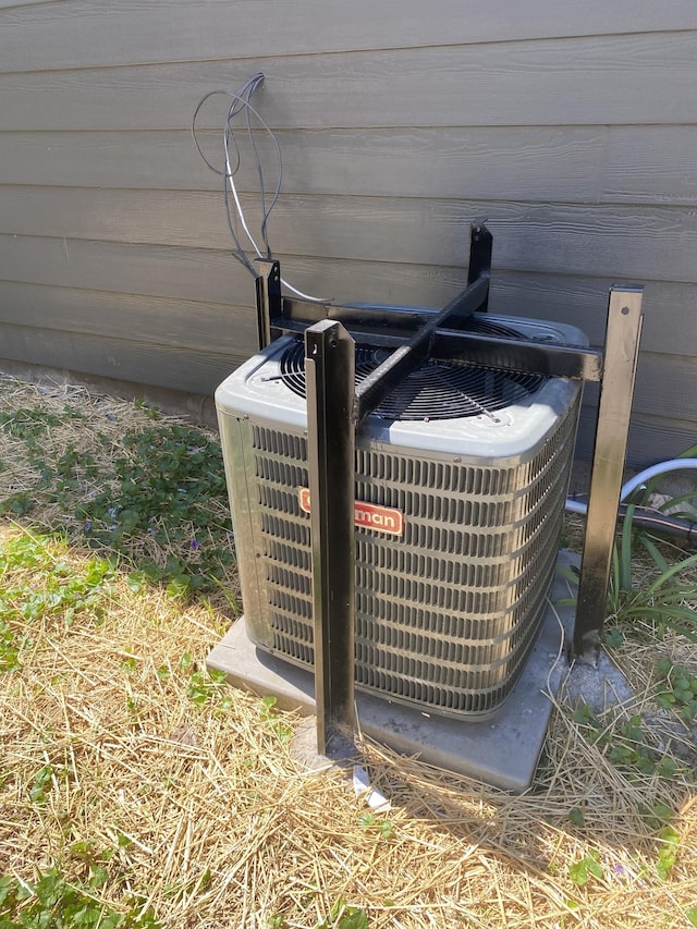 exterior details featuring cooling unit