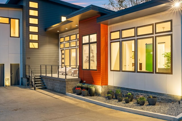 view of property exterior at dusk