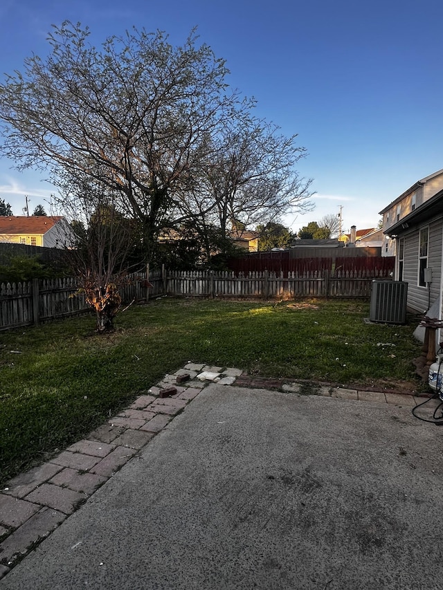 914 Lavergne Ln, La Vergne, TN 37086 - view of yard with central AC, a fenced backyard, and a patio area