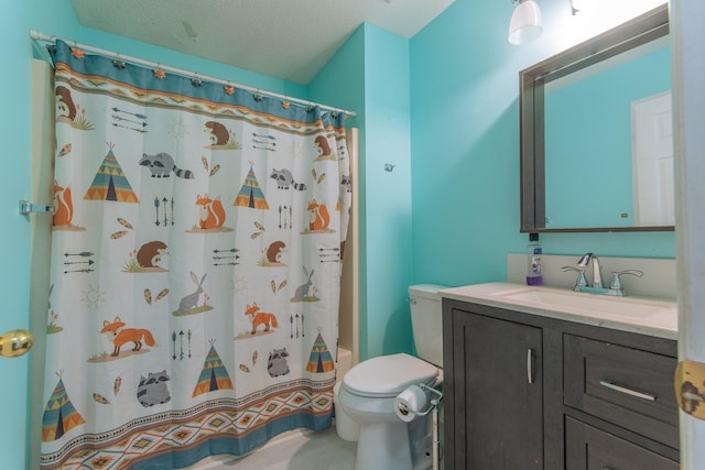 bathroom featuring toilet, a shower with curtain, and vanity