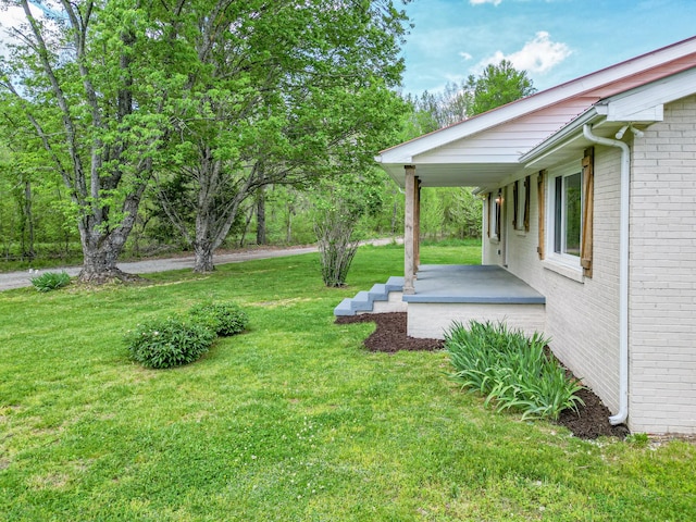 view of yard featuring a porch