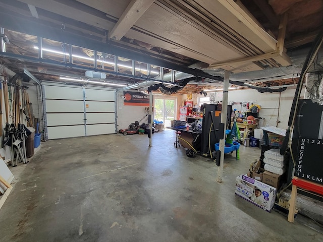 garage featuring a garage door opener