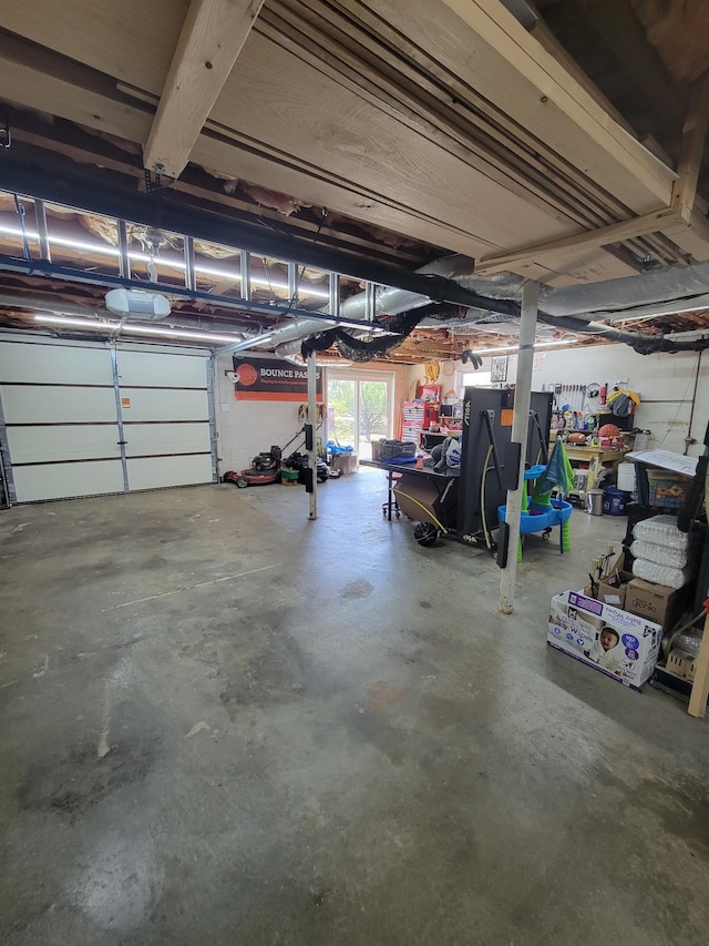 garage featuring a garage door opener