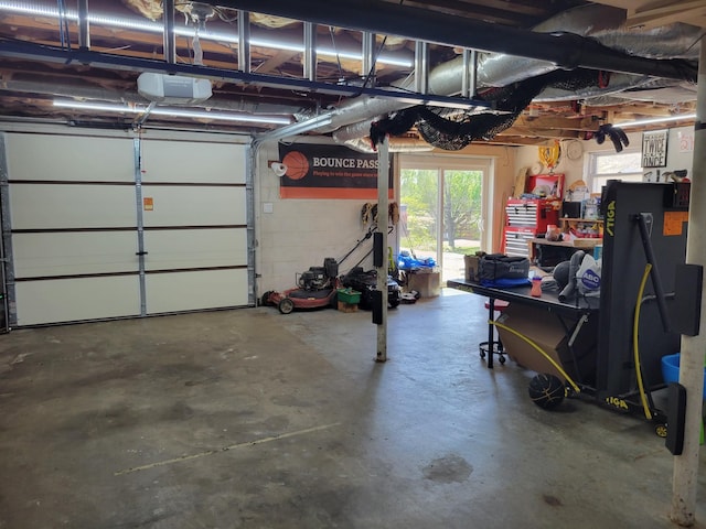 garage featuring a garage door opener
