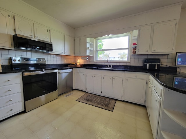 kitchen with a sink, open shelves, stainless steel appliances, and white cabinetry