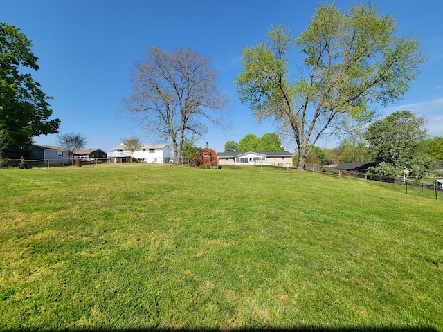 view of yard with fence