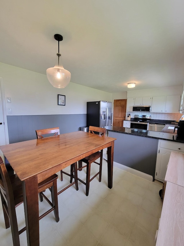 dining room with light floors