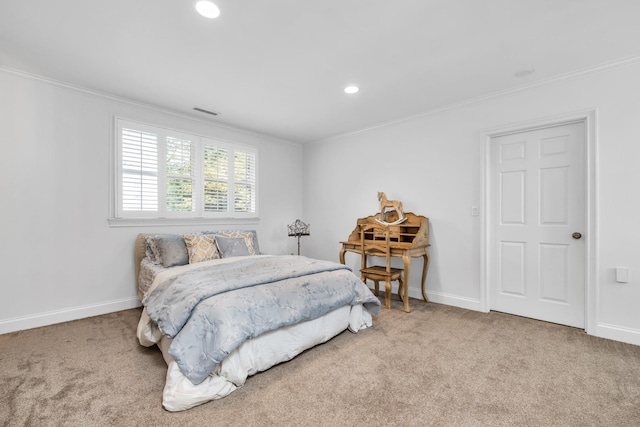 carpeted bedroom featuring ornamental molding, recessed lighting, visible vents, and baseboards