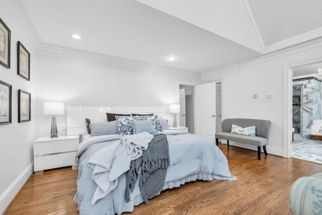 bedroom featuring crown molding, recessed lighting, and wood finished floors
