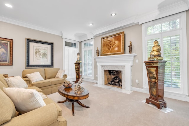 carpeted living room with a fireplace, crown molding, recessed lighting, and baseboards