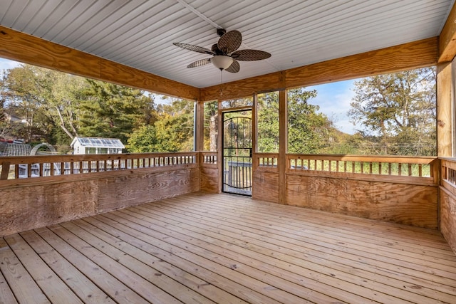 913 Branch Rd, Clarksville, TN 37043 - deck featuring a storage unit, ceiling fan, and an outbuilding