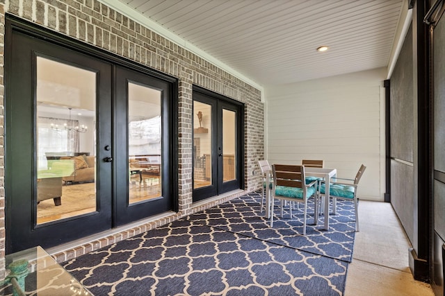 view of patio / terrace with outdoor dining space and french doors