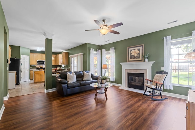 1320 Autumn Springs Ln, Old Hickory, TN 37138 - living area with wood finished floors, ceiling fan, baseboards, and a tile fireplace