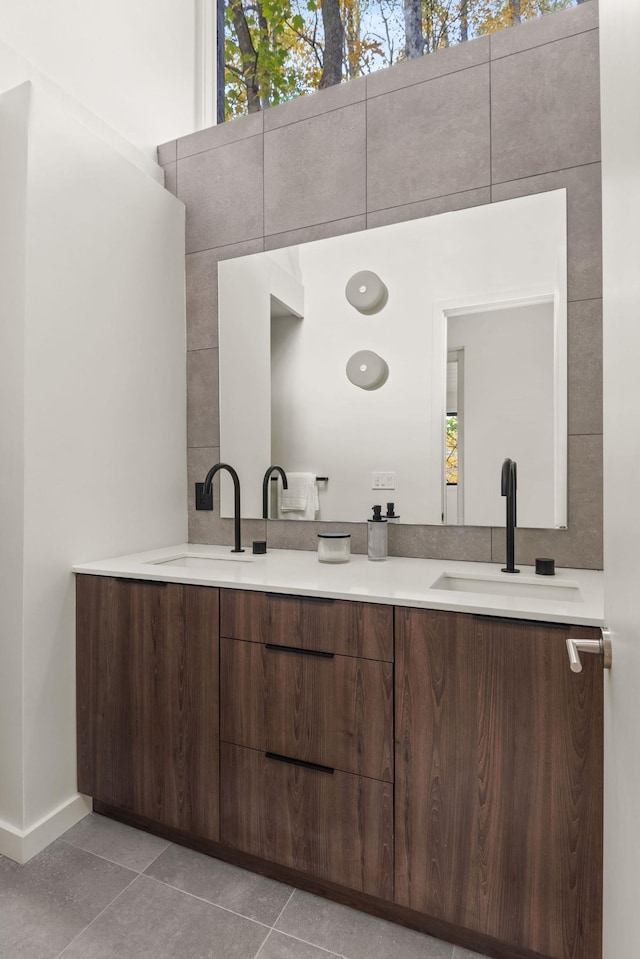 5040 Villa Crest Dr, Nashville, TN 37220 - bathroom with baseboards, double vanity, and tile patterned floors