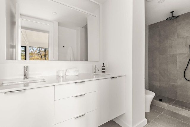 5040 Villa Crest Dr, Nashville, TN 37220 - full bath with a tile shower, double vanity, toilet, and tile patterned flooring
