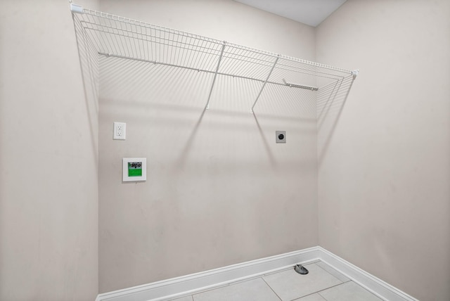 223 Casting Ct, Clarksville, TN 37043 - laundry area with baseboards, tile patterned flooring, laundry area, and hookup for an electric dryer