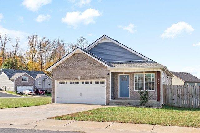 223 Casting Ct, Clarksville, TN 37043 - view of front facade featuring brick siding, fence, a garage, a front lawn, and concrete driveway
