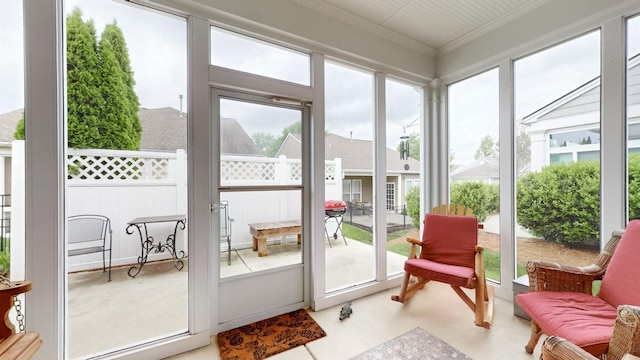 sunroom / solarium with crown molding