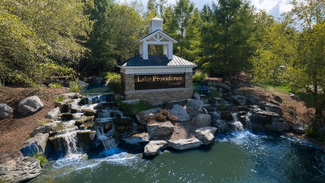 view of community sign