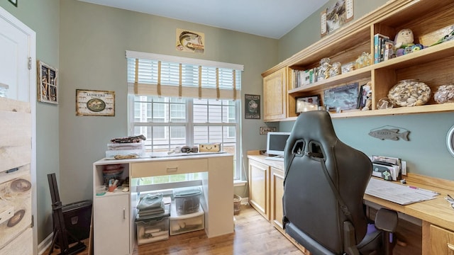 home office featuring light wood-type flooring
