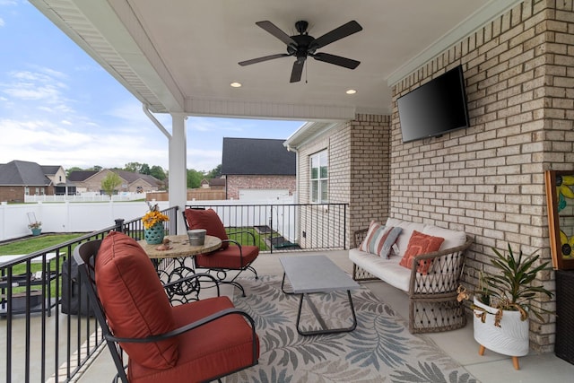balcony with a ceiling fan