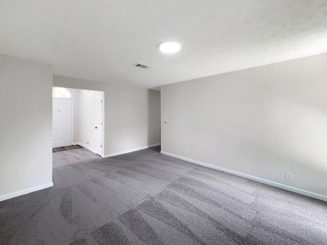 616 Hardin Shire Dr, Old Hickory, TN 37138 - spare room featuring baseboards, visible vents, and dark colored carpet