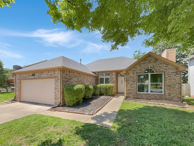 616 Hardin Shire Dr, Old Hickory, TN 37138 - ranch-style house with a garage, brick siding, a front yard, and driveway
