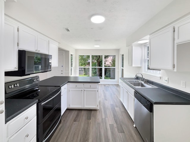 616 Hardin Shire Dr, Old Hickory, TN 37138 - kitchen featuring range with two ovens, dishwasher, white cabinets, and a sink