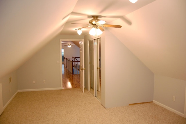 547 Grindstone Hollow Rd, Dickson, TN 37055 - additional living space with ceiling fan, light carpet, vaulted ceiling, and baseboards