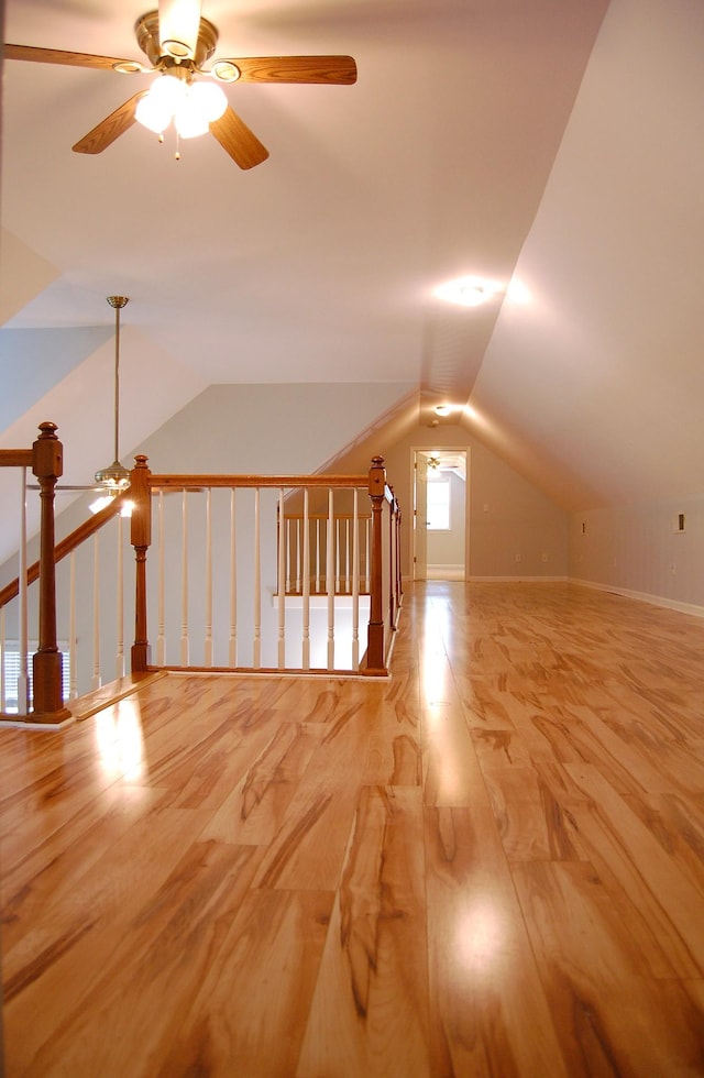 547 Grindstone Hollow Rd, Dickson, TN 37055 - additional living space featuring ceiling fan, wood finished floors, vaulted ceiling, and baseboards