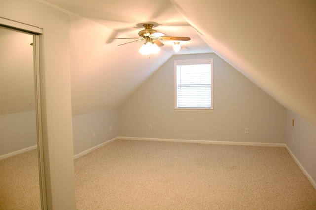 547 Grindstone Hollow Rd, Dickson, TN 37055 - additional living space with light carpet, vaulted ceiling, ceiling fan, and baseboards