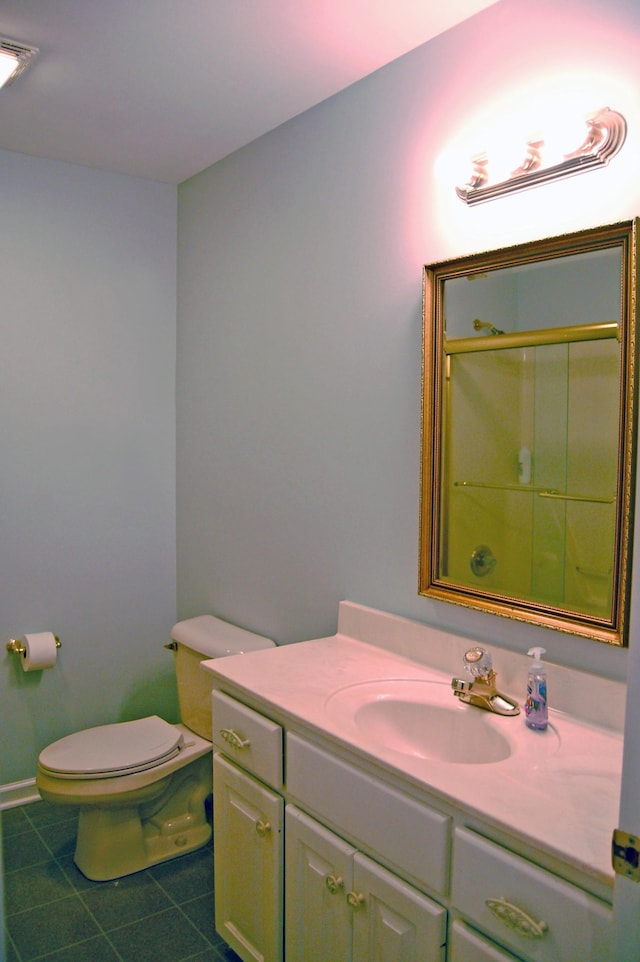 547 Grindstone Hollow Rd, Dickson, TN 37055 - full bathroom with vanity, toilet, tile patterned flooring, and an enclosed shower