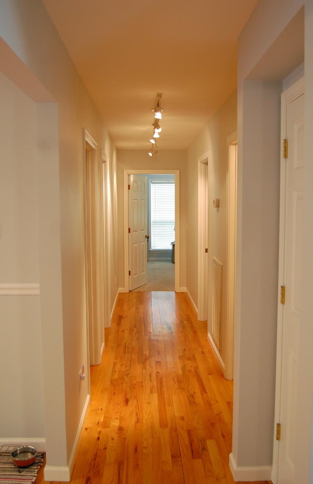 547 Grindstone Hollow Rd, Dickson, TN 37055 - corridor featuring light wood-style flooring and baseboards