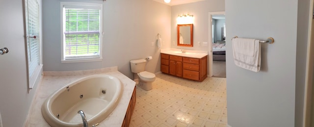 547 Grindstone Hollow Rd, Dickson, TN 37055 - full bathroom featuring vanity, a tub with jets, tile patterned floors, and toilet