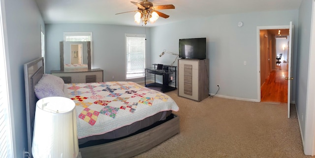 547 Grindstone Hollow Rd, Dickson, TN 37055 - carpeted bedroom with baseboards and ceiling fan